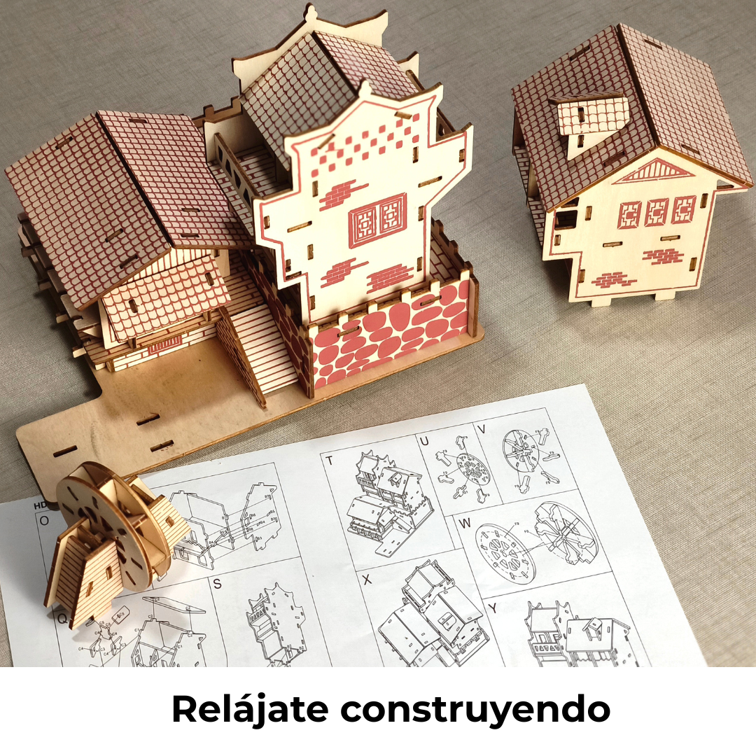 Rompecabezas 3D de madera casi terminado sobre la hoja de instrucciones, momento final del montaje ideal para desconectar y relajarse.