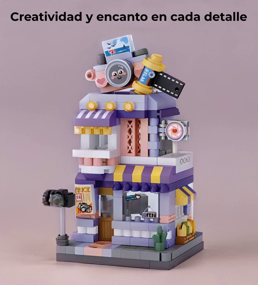 Mini Tienda de Fotografía montada sobre fondo morado, resaltando su encanto visual y estimulando la creatividad