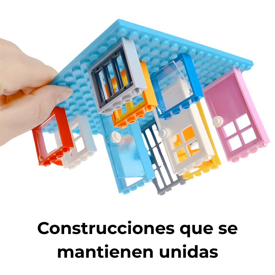 Demostración de la firmeza de encaje entre bloques y placa base, con una mano sujetando la estructura patas arriba