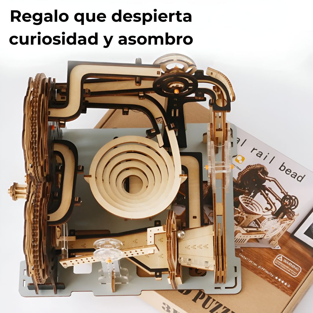 Kit puzzle 3D madera con canicas sobre su caja — regalo original para amantes de los rompecabezas y proyectos DIY.