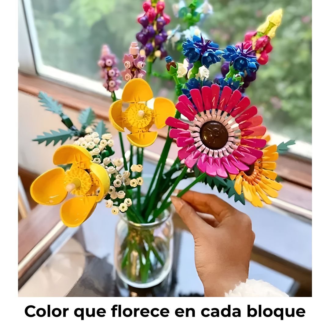 Ramo de flores tipo LEGO en jarrón con mano femenina, resaltando la paleta de colores vibrantes